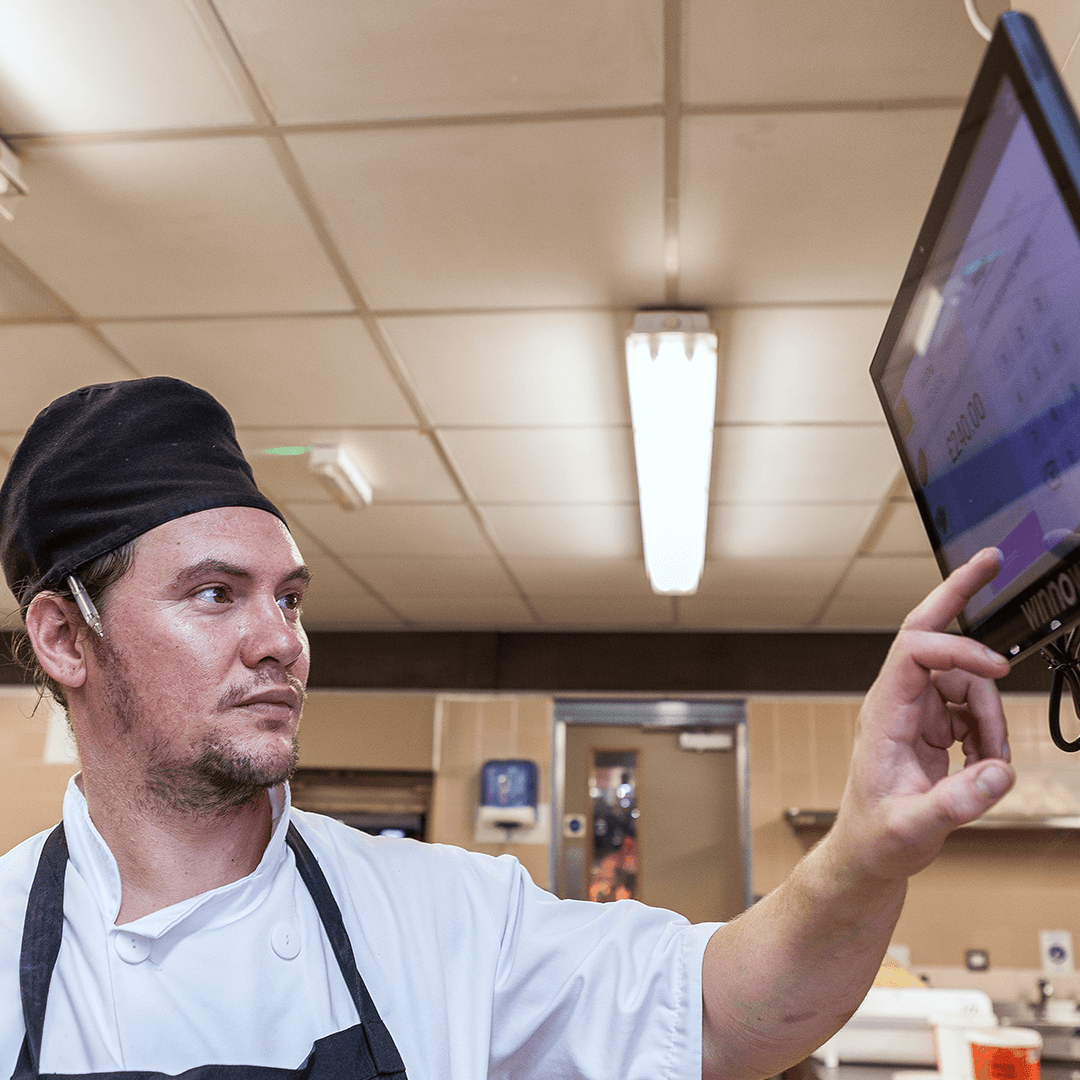 Chef using Winnow technology to control waste management in catering industry