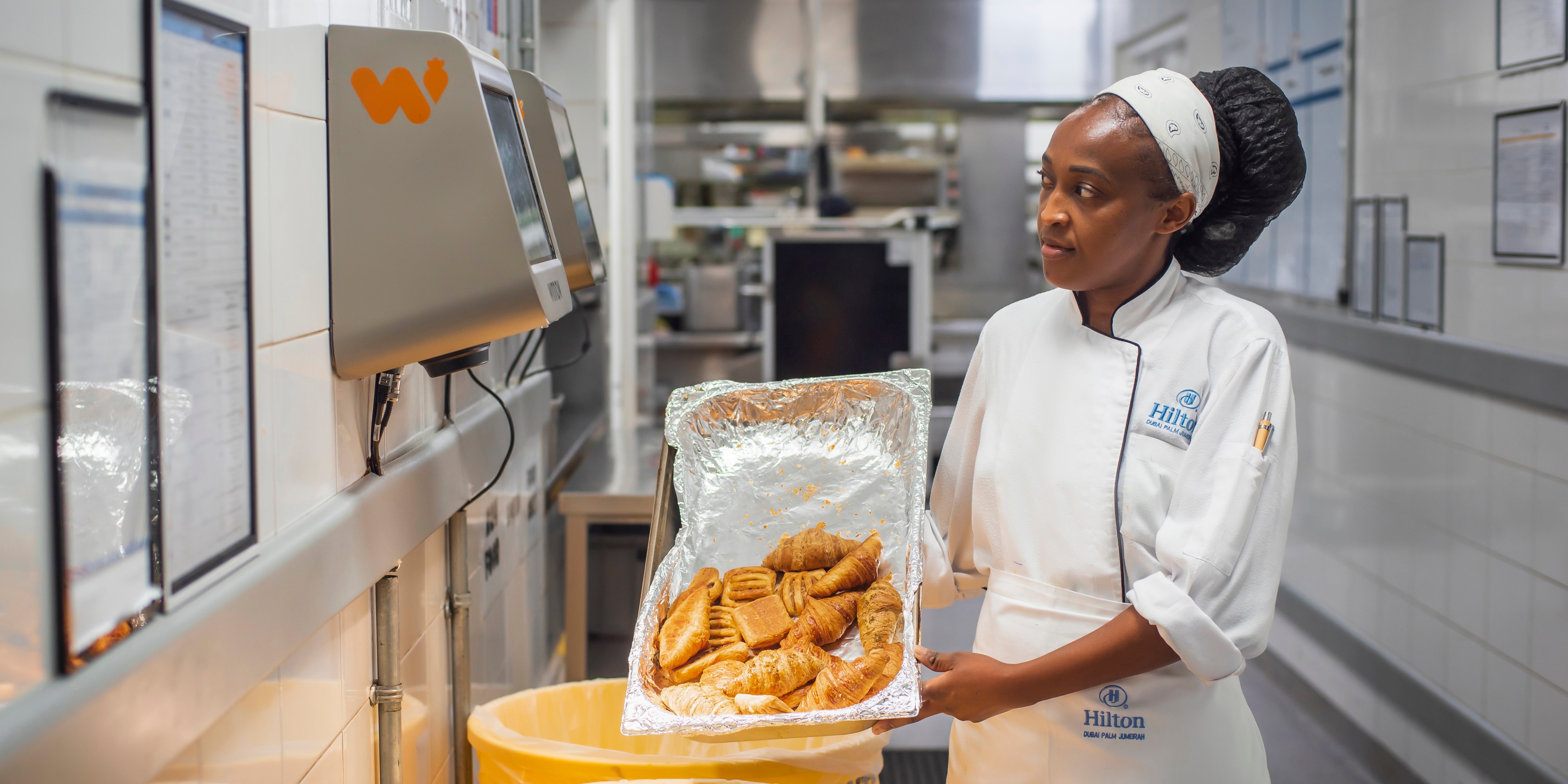 Chef binning food waste